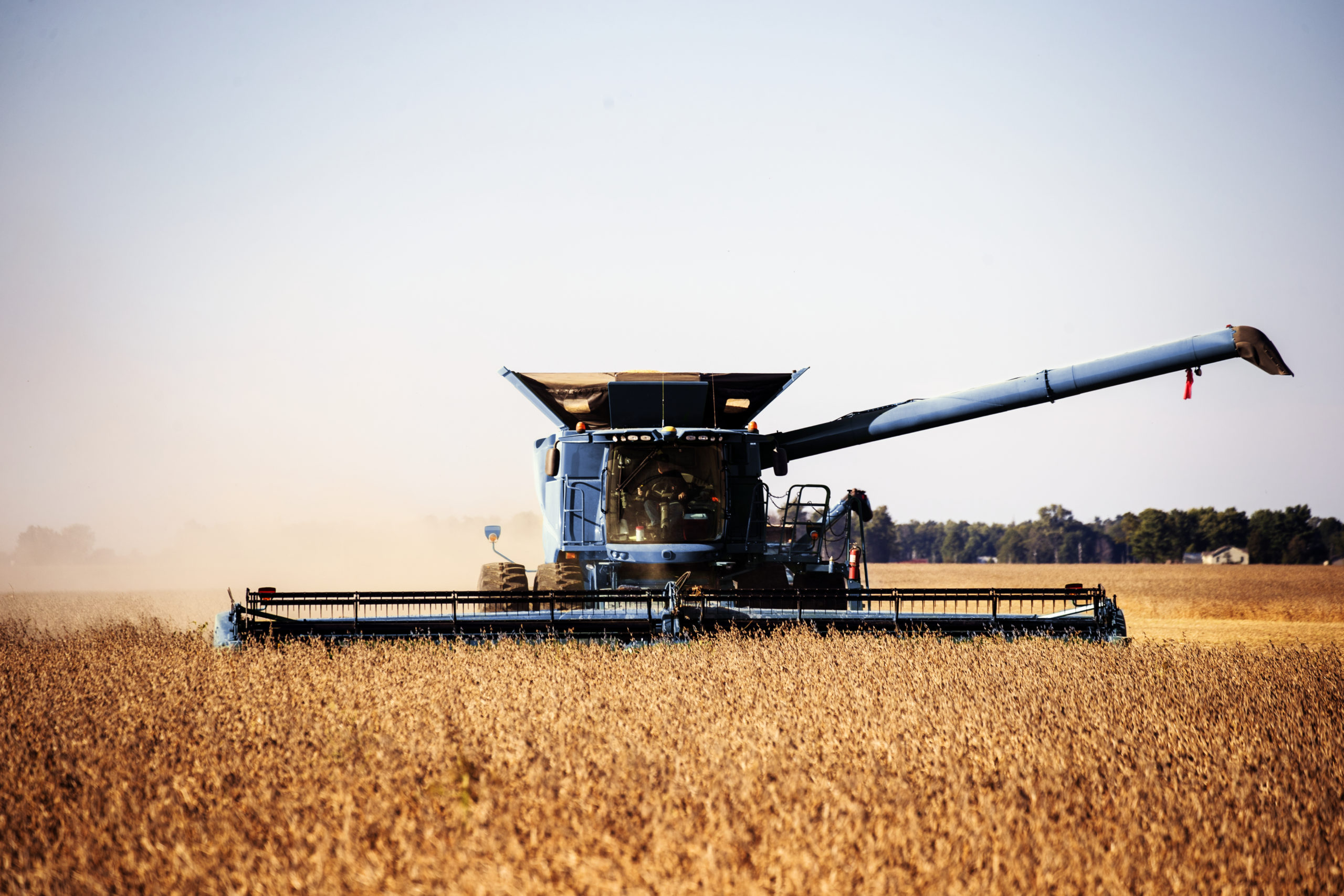 A harvesting operation kicks up dust in rural Carroll County, Indiana. Original image from Carol M. Highsmith’s America, Library of Congress collection. Digitally enhanced by rawpixel.